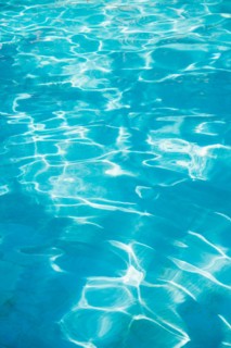 Water in swimming pool.