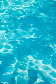 Water in swimming pool.