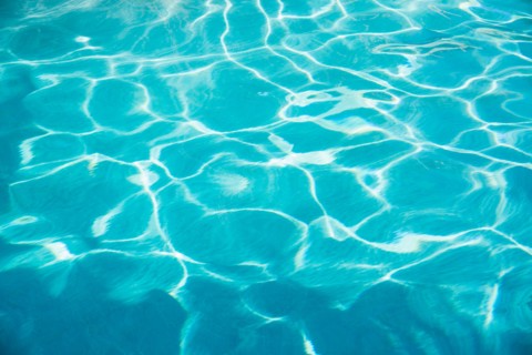 Water in swimming pool.