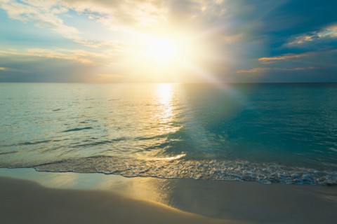 Sun setting over sea. Jamaica.