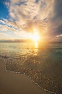 Sun setting over sea. Jamaica.
