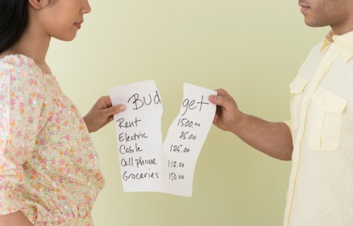 Young couple fighting over home budget.