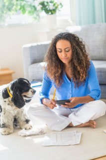 Young woman dealing with home finance.
