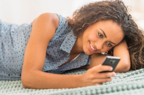 Young woman using smartphone.