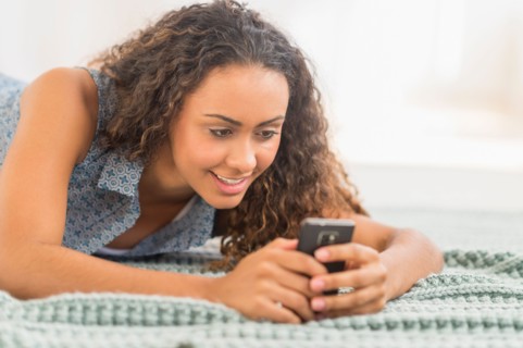 Young woman using smartphone.