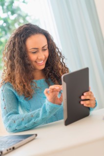 Young woman in home office.