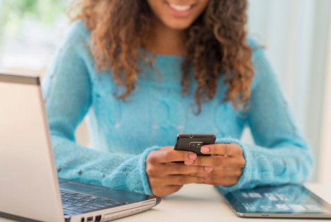 Young woman in home office.
