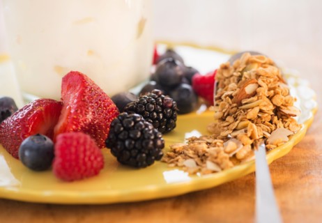 Healthy breakfast with fruits, cereal and yoghurt