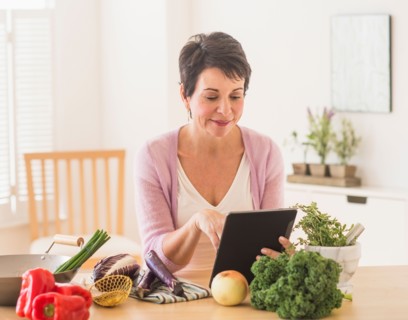 Portrait of mature woman in kitchen