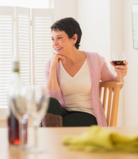 Portrait of mature woman holding wine glass