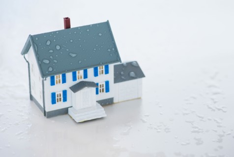 Studio Shot of artificial house during flood