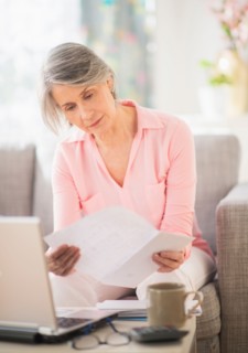 Portrait of woman working at home