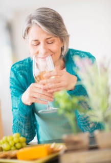 Portrait of woman holding wine glass