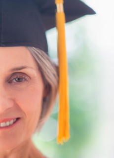Portrait of woman in graduation cap