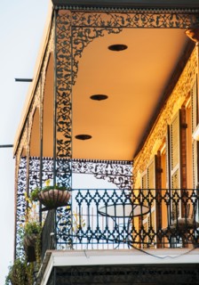 Ornate balcony with potted plants