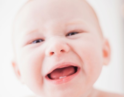 Studio shot portrait of baby boy (18-23 months) with open mouth