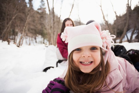 Portrait of Girl (2-3) grinning to camera