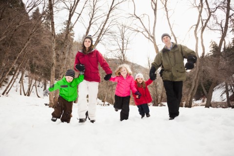 Three children (2-3, 4-5) with parents during stroll