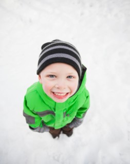 Directly above portrait of standing boy (4-5) looking up