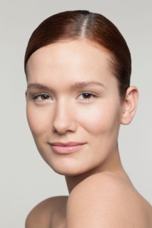 Studio shot portrait of young woman