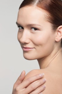 Studio shot portrait of young woman