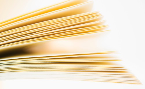 Book pages in motion.