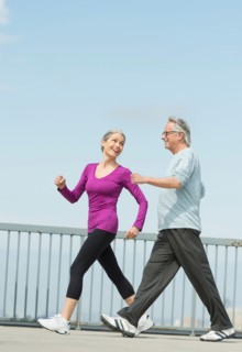 Senior couple walking together.