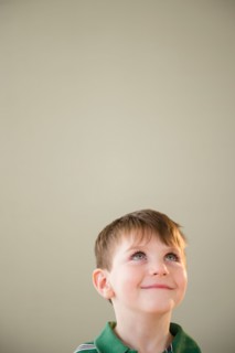 Portrait of boy (4-5) daydreaming