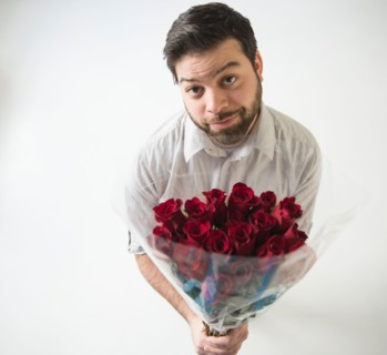 Portrait of man with bouquet