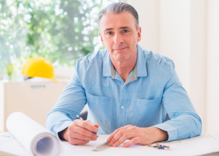 Portrait of man working in office