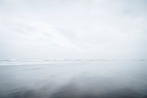 Fog over sandy beach