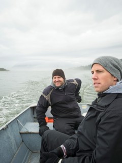 Portrait of men in boat