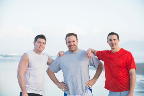 Portrait of men on beach