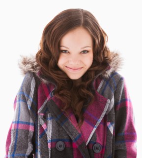 Portrait of smiling girl (12-13)