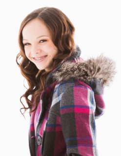 Portrait of smiling girl (12-13)