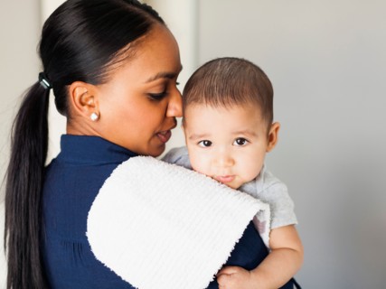 Mother with her baby boy (2-5 months)