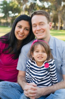 Portrait of happy family in park
