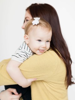Portrait of mother with daughter (12-17 months)