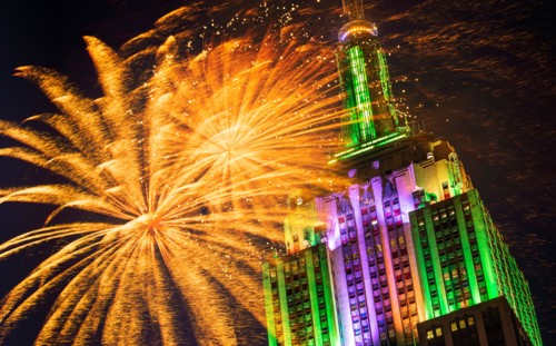 New York City, New York. Empire state building with firework display.