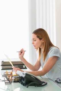 Business woman working in office.