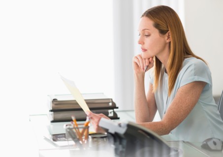Business woman working in office.