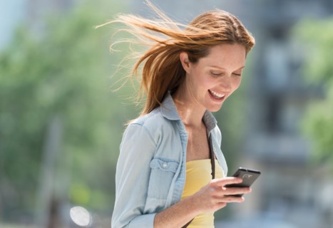 Woman using phone.