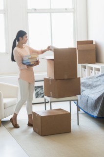 Woman moving home.