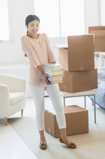 Woman moving home.