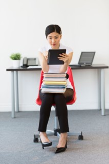 Businesswoman using tablet pc.