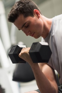 Man lifting dumbbells.