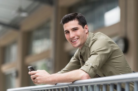 Man text messaging.