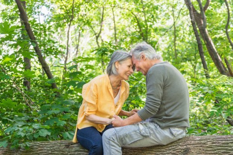 Central Park, New York City. Senior couple relaxing in park.