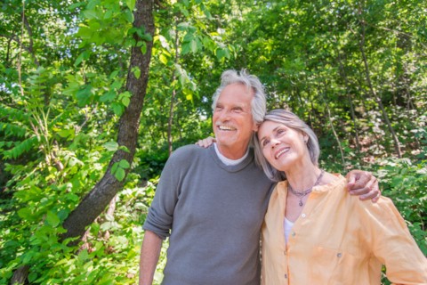 Senior couple relaxing in park.