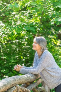 Central Park, New York City. Senior woman relaxing in park.